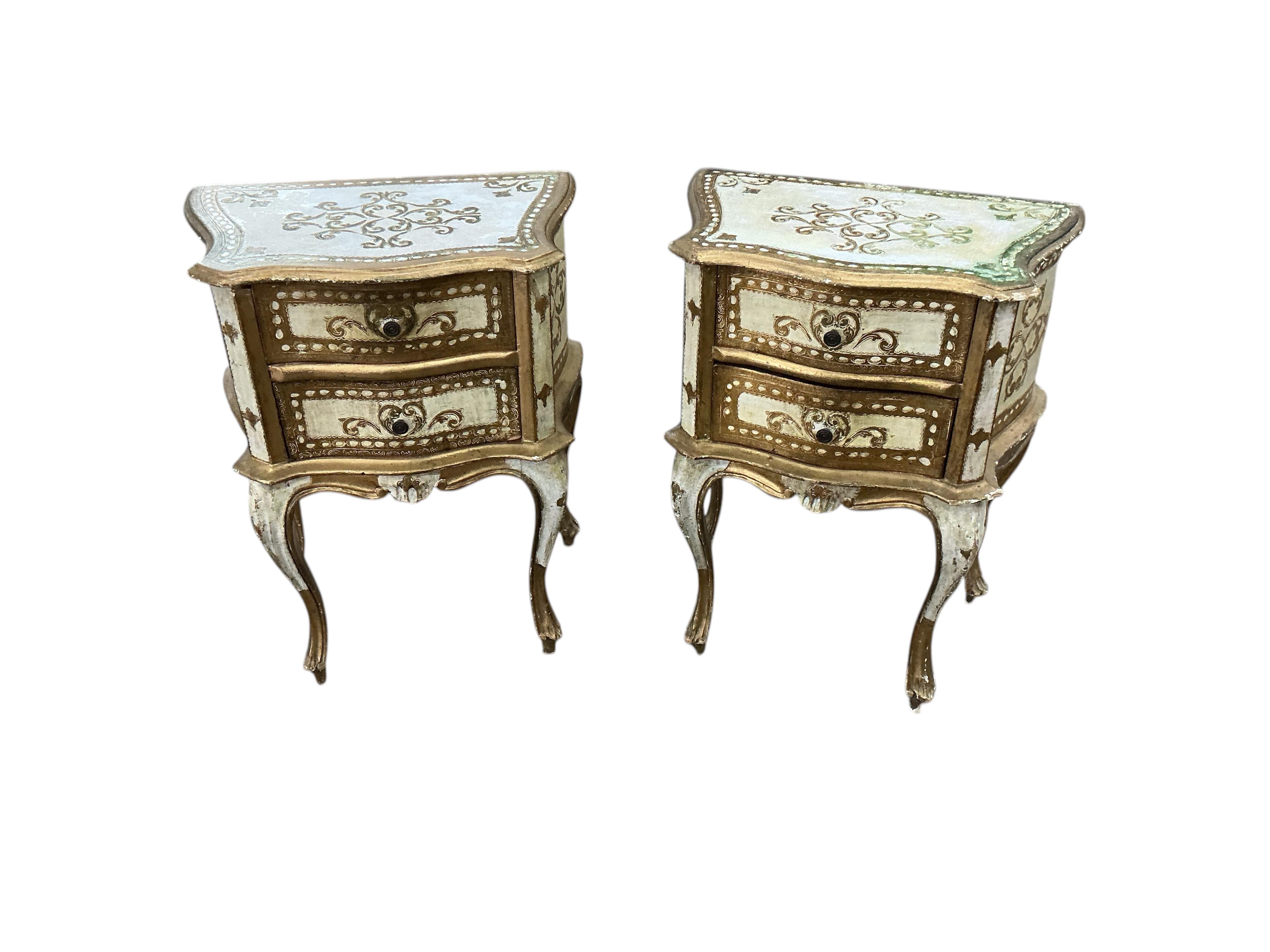 A pair of mid 20th century Italian painted two drawer bedside chests, width 45cm, depth 29cm, height 59cm
